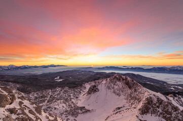 Vivid sunrise in the mountains. A red morning in the Julian Alps.