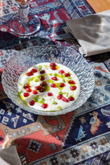 Oriental yogurt soup with pomegranate