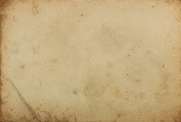 The texture of an old shabby dirty cardboard photo card with a crumpled corner, the texture of an...