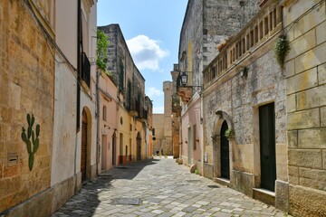 Fototapeta na wymiar A street in the historic center of Tricase, a medieval town in the Puglia region, Italy.