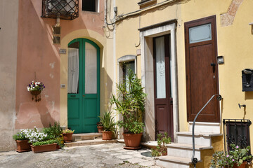 The doors of an house in the historic center of Tricase, a medieval town in the Puglia region, Italy.