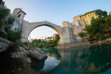 Photo sur Plexiglas Stari Most Historical Stari Most bridge over Neretva river in Mostar Old town, Balkan mountains, Bosnia and Herzegovina