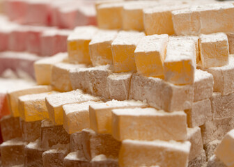 Lines of Turkish Delights on bazaar in Stambul