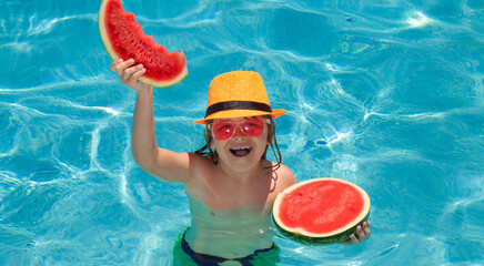 Child eating watermelon near swimming pool during summer holidays. Kids eat fruit outdoors. Healthy fruits for children.