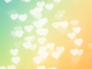Green and yellow tones background with bokeh light. Hearts motif. Romantic pattern.	