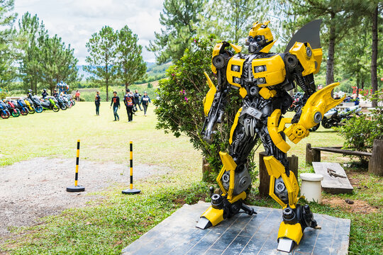 Phetchabun, Thailand - May, 07, 2021 :The Replica of Bumblebee robot made from iron part of a Car display in the park at Petchabun, Thailand.