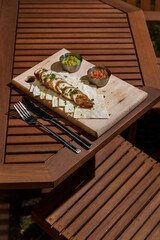 Pieces of meat with parsley, pita bread