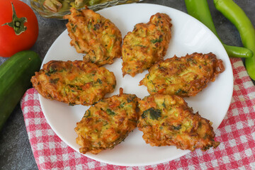 Mucver, Turkish traditional food. (Turkish cuisine) Homemade Food with Zucchini.