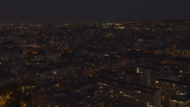 Panorama on residential buildings of the fifteenth arrondissement at night seen from the Eiffel Tower in Paris, France