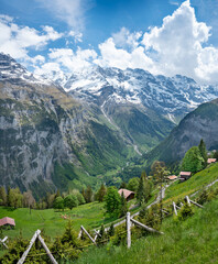 Fototapeta na wymiar Landscape of Lauterbrunnen valley with view on Eiger in Swiss Alps, Switzerland. Hiking trail from Murren to Gimmelwald.