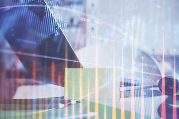 Forex market chart hologram and personal computer background. Double exposure. Concept of investment.