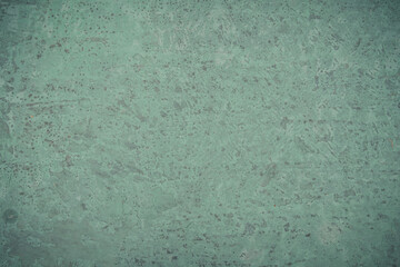 Beautiful abstract green old plaster wall. Textured background.