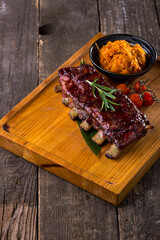 Pork ribs in cherry sauce with stewed cabbage.