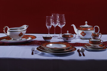 Luxury china dinnerware. Elegant golden design porcelain dishes.