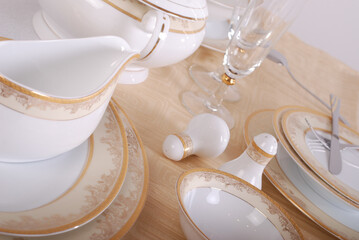 Luxury china dinnerware. Elegant golden design porcelain dishes.