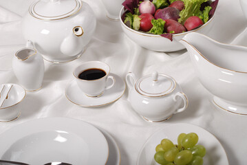 Luxury china dinnerware. Elegant golden design porcelain dishes.