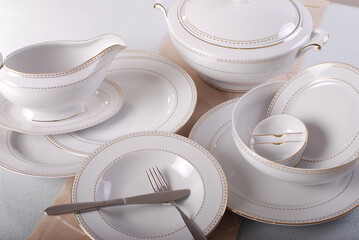 Luxury china dinnerware. Elegant golden design porcelain dishes.