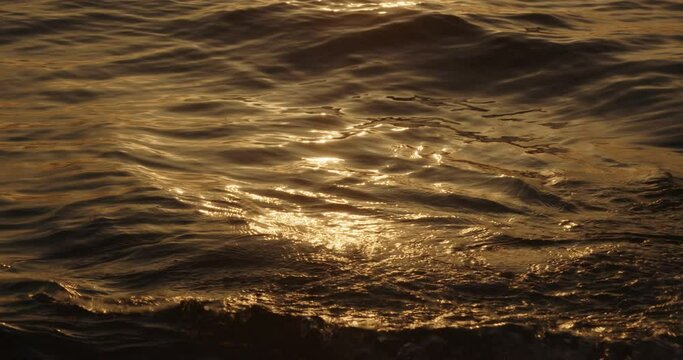 Waves on golden light of sunset, Mljet Island, the Adriatic Sea in Croatia