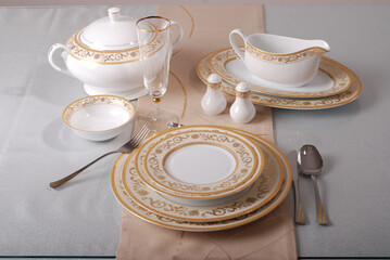 Luxury and elegant porcelain dinner set with a classy golden design.