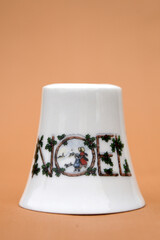 Porcelain globe for decorating the Christmas tree. Winter Holiday and Xmas ornament.