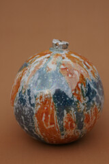Porcelain globe for decorating the Christmas tree. Winter Holiday and Xmas ornament.