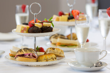 A delightfully decadent champagne afternoon tea - obrazy, fototapety, plakaty
