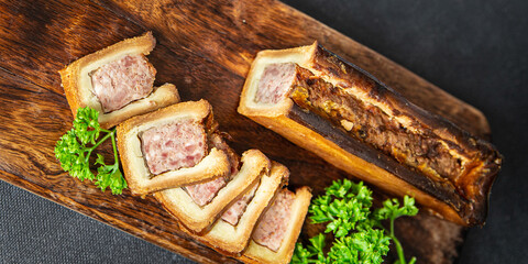 pate croute meat in dough pork, beef, chicken french food fresh healthy meal food snack diet on the table copy space food background rustic top view - obrazy, fototapety, plakaty
