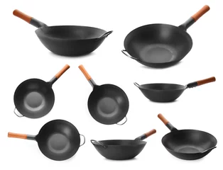 Foto op Canvas Set with empty woks on white background © New Africa
