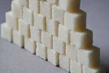 Almaty, Kazakhstan - 03.28.2022 : Sugar cubes are laid out on the kitchen table