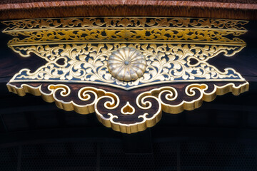 Detailed roof ornamentation, at one of the heritage buildings at Kyoto's Imperial Palace, Japan.