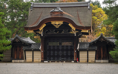 Kenshunmon Gate of the Imperial Palace area in Kyoto, Japan. Historic traditional Japanese architecture - Landmark situated in Kyōto Gyoen park, now open to the public.