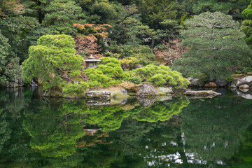 Fototapeta na wymiar Gonaitei garden on beautiful autumn day in Kyoto Imperial palace in Kyoto, Japan. Oike-niwa - serene japanese zen garden and pond