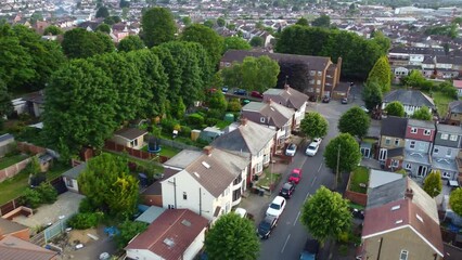 low level flight of drone over home's of England and Streets Aerial footage