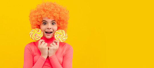OMG. Surprised child hold lollipops. Lollipop fun. Childhood and girlhood. Try taste of sweet life. Funny teenager child on party, poster banner header with copy space.