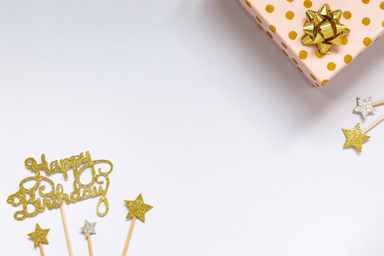 Gold Happy Birthday Sign And Pink Gift Box In Gold Dots