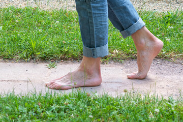 Barefoot on a path
