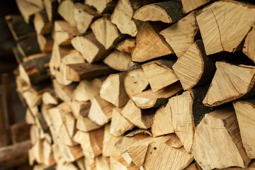 Printed roller blinds Layered chopped firewood for the stove. TEXTURE