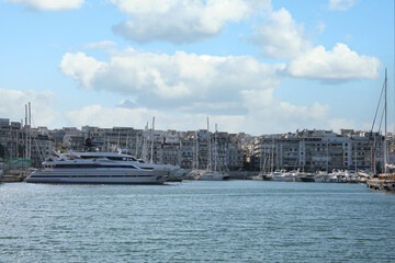 Obraz premium Picturesque view of port with modern boats on sunny day