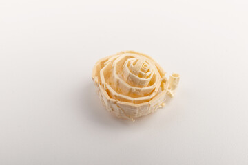 Wood chips isolated on light background. Wooden shavings.