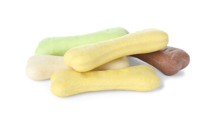 Different bone shaped dog cookies on white background