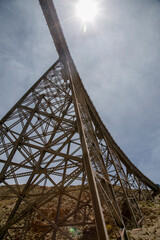 old cast iron and riveted train bridge in northern argentina
