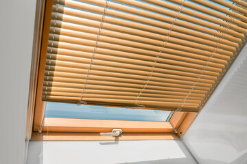 mansard roof window with shutter blinds. - 514189764