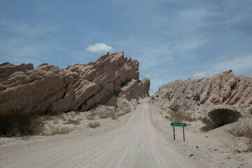 Gravel road through the Quebrada de las flechas in Salta, Argentina