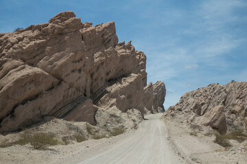 Gravel road through the Quebrada de las flechas in Salta, Argentina