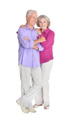 Portrait of happy senior couple on white background