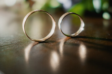 wedding rings on the table