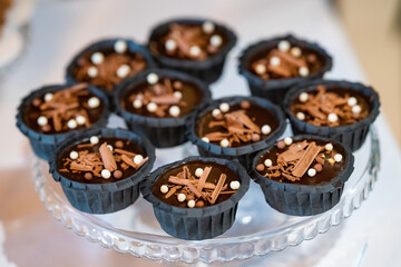 chocolate cupcakes with icing sugar