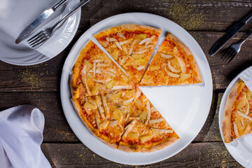 Pizza with cheese, pineapple and chicken