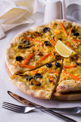Pizza with cheese, mussels