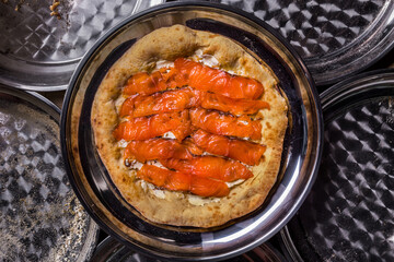 Pizza with salmon and cheese